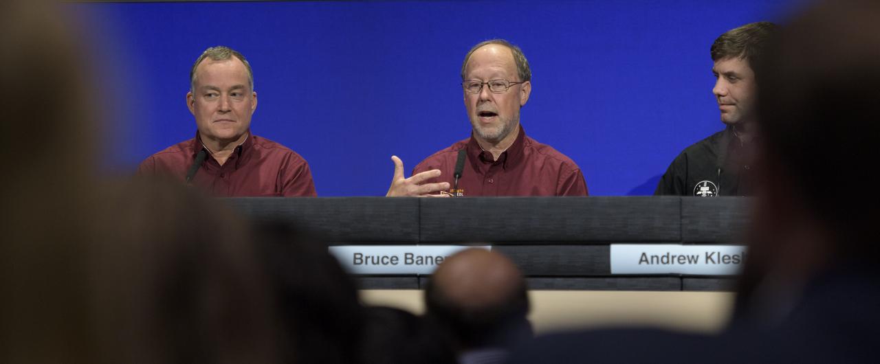 Bruce Banerdt, InSight Principal Investigator, NASA JPL, center, answers questions during a Mars InSight post-landing press conference, Monday, Nov. 26, 2018 at NASA's Jet Propulsion Laboratory in Pasadena, California. InSight, short for Interior Exploration using Seismic Investigations, Geodesy and Heat Transport, is a Mars lander designed to study the "inner space" of Mars: its crust, mantle, and core. Photo Credit: (NASA/Bill Ingalls)