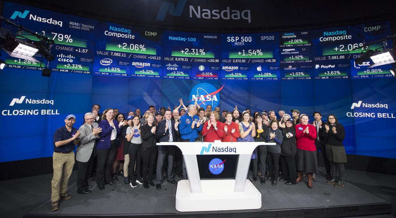NASA Deputy Associate Administrator Melanie Saunders and former NASA astronaut Mike Massimino ring the closing bell of the Nasdaq after the NASA's InSight lander successfully touched down on the surface of Mars, Monday, Nov. 26, 2018 at the Nasdaq MarketSite in New York City. The lander sent a signal affirming a completed landing sequence at approximately 3 p.m. EST (noon PST) after touching down on the western side of a flat, smooth expanse of lava called Elysium Planitila. InSight, short for Interior Exploration using Seismic Investigations, Geodesy and Heat Transport, is a Mars lander designed to study the "inner space" of Mars: its crust, mantle, and core. Photo Credit: (NASA/Joel Kowsky)