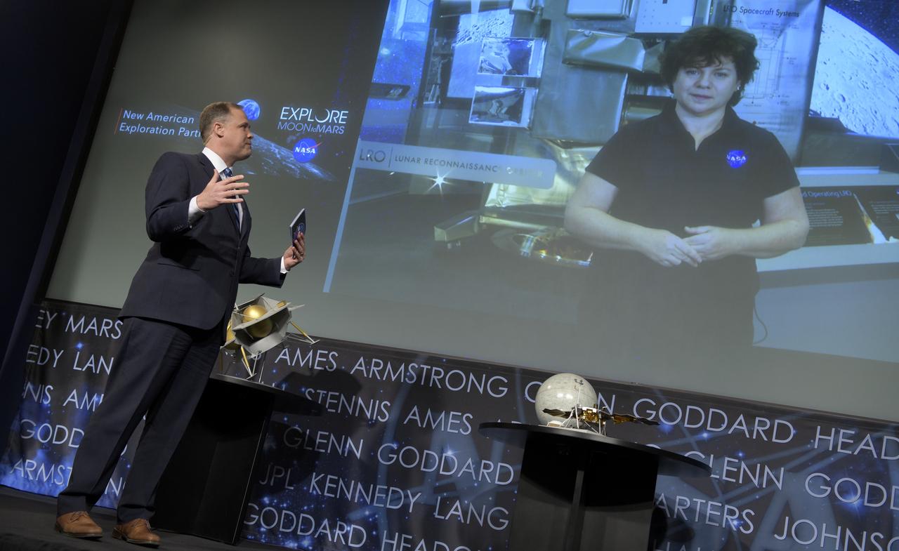 NASA Administrator Jim Bridenstine talks with Barbara Cohen, associate project scientist for the Lunar Reconnaissance Orbiter at NASA’s Goddard Space Flight Center in Greenbelt, Maryland during a event where it was announced that nine U.S. companies are eligible to bid on NASA delivery services to the lunar surface through Commercial Lunar Payload Services (CLPS) contracts, Thursday, Nov. 29, 2018 at NASA Headquarters in Washington. The companies will be able to bid on delivering science and technology payloads for NASA, including payload integration and operations, launching from Earth and landing on the surface of the Moon. NASA expects to be one of many customers that will use these commercial landing services. Photo Credit: (NASA/Bill Ingalls)