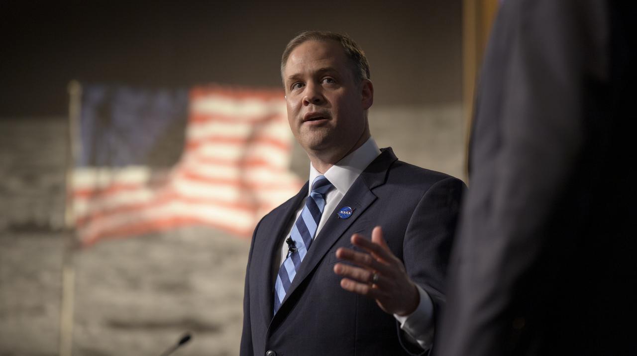 NASA Administrator Jim Bridenstine answers questions during an event where nine U.S. companies where named as eligible to bid on NASA delivery services to the lunar surface through Commercial Lunar Payload Services (CLPS) contracts, Thursday, Nov. 29, 2018 at NASA Headquarters in Washington. The companies will be able to bid on delivering science and technology payloads for NASA, including payload integration and operations, launching from Earth and landing on the surface of the Moon. NASA expects to be one of many customers that will use these commercial landing services. Photo Credit: (NASA/Bill Ingalls)