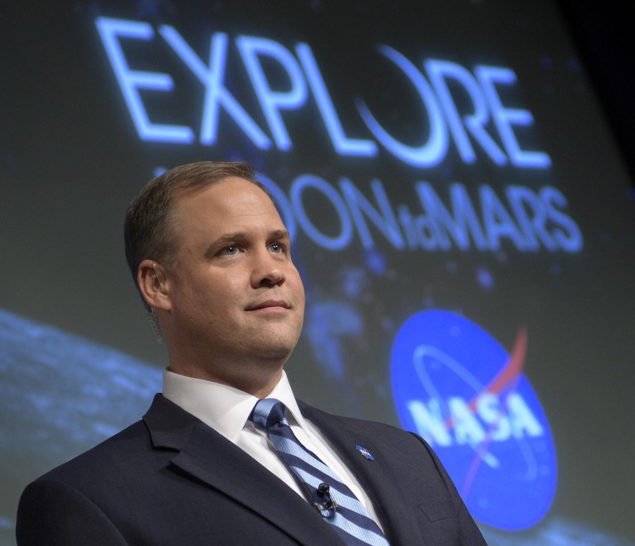 NASA Administrator Jim Bridenstine answers questions during an event where nine U.S. companies where named as eligible to bid on NASA delivery services to the lunar surface through Commercial Lunar Payload Services (CLPS) contracts, Thursday, Nov. 29, 2018 at NASA Headquarters in Washington. The companies will be able to bid on delivering science and technology payloads for NASA, including payload integration and operations, launching from Earth and landing on the surface of the Moon. NASA expects to be one of many customers that will use these commercial landing services. Photo Credit: (NASA/Bill Ingalls)