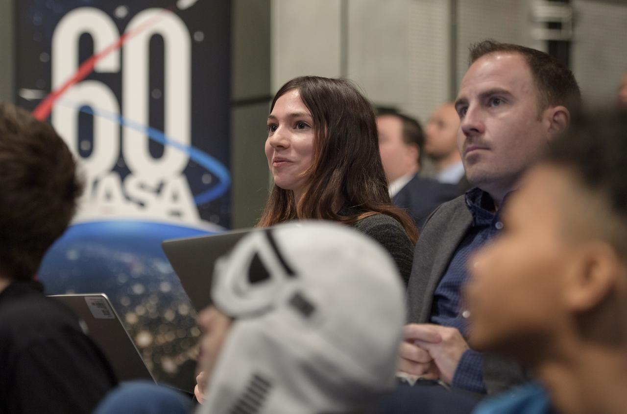 Thalia Patrinos, and Jason Townsend from NASA's Social Media Teamm monitor questions coming in from social media during an event where nine U.S. companies where named as eligible to bid on NASA delivery services to the lunar surface through Commercial Lunar Payload Services (CLPS) contracts, Thursday, Nov. 29, 2018 at NASA Headquarters in Washington. The companies will be able to bid on delivering science and technology payloads for NASA, including payload integration and operations, launching from Earth and landing on the surface of the Moon. NASA expects to be one of many customers that will use these commercial landing services. Photo Credit: (NASA/Bill Ingalls)