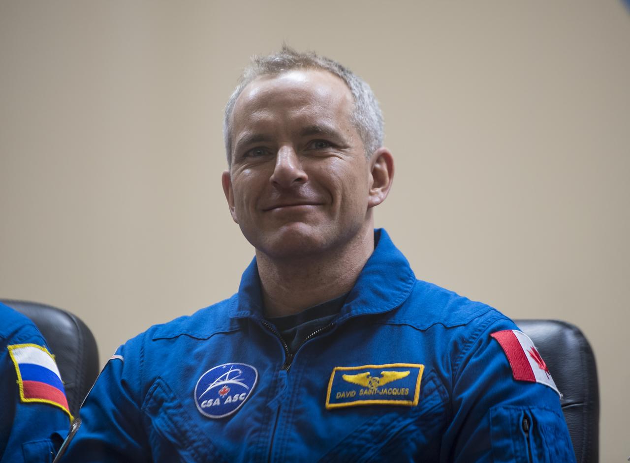 Expedition 58 Flight Engineer David Saint-Jacques of the Canadian Space Agency (CSA) is seen during a press conference, Sunday, Dec. 2, 2018 at the Cosmonaut Hotel in Baikonur, Kazakhstan. Launch of the Soyuz rocket is scheduled for Dec. 3 and will carry Saint-Jacques, Soyuz Commander Oleg Kononenko of Roscosmos, and Flight Engineer Anne McClain of NASA, into orbit to begin their six and a half month mission on the International Space Station. Photo Credit: (NASA/Aubrey Gemignani).