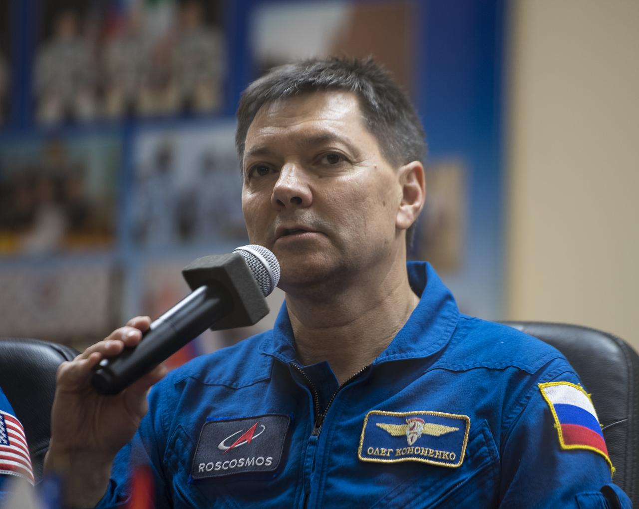 Expedition 58 Soyuz Commander Oleg Kononenko of Roscosmos, answers a question during a press conference, Sunday, Dec. 2, 2018 at the Cosmonaut Hotel in Baikonur, Kazakhstan. Launch of the Soyuz rocket is scheduled for Dec. 3 and will carry Kononenko, Flight Engineer Anne McClain of NASA, and Flight Engineer David Saint-Jacques of the Canadian Space Agency (CSA) into orbit to begin their six and a half month mission on the International Space Station. Photo Credit: (NASA/Aubrey Gemignani).
