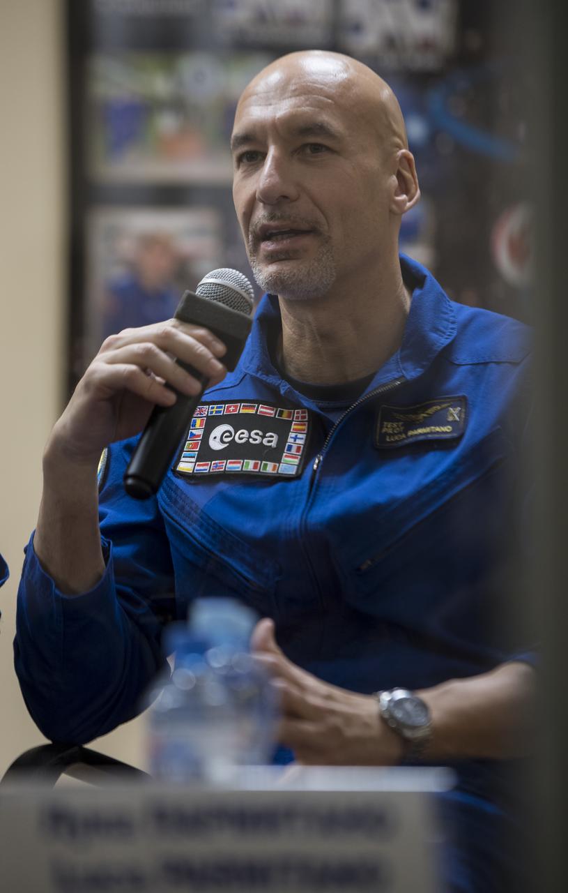 Expedition 58 backup crew member, Flight Engineer Luca Parmitano of ESA (European Space Agency), speaks during a press conference, Sunday, Dec. 2, 2018 at the Cosmonaut Hotel in Baikonur, Kazakhstan. Launch of the Soyuz rocket is scheduled for Dec. 3 and will carry Expedition 58 prime crew members, Soyuz Commander Oleg Kononenko of Roscosmos, Flight Engineer Anne McClain of NASA, and Flight Engineer David Saint-Jacques of the Canadian Space Agency (CSA) into orbit to begin their six and a half month mission on the International Space Station. Photo Credit: (NASA/Aubrey Gemignani).