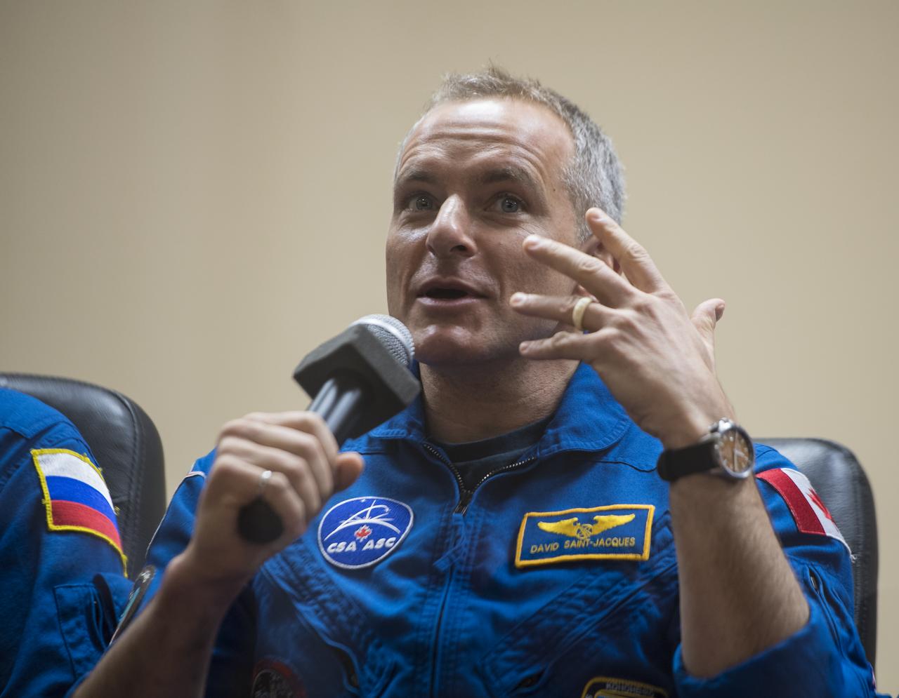Expedition 58 Flight Engineer David Saint-Jacques of the Canadian Space Agency (CSA) answers a question during a press conference, Sunday, Dec. 2, 2018 at the Cosmonaut Hotel in Baikonur, Kazakhstan. Launch of the Soyuz rocket is scheduled for Dec. 3 and will carry Saint-Jacques, Soyuz Commander Oleg Kononenko of Roscosmos, and Flight Engineer Anne McClain of NASA into orbit to begin their six and a half month mission on the International Space Station. Photo Credit: (NASA/Aubrey Gemignani).