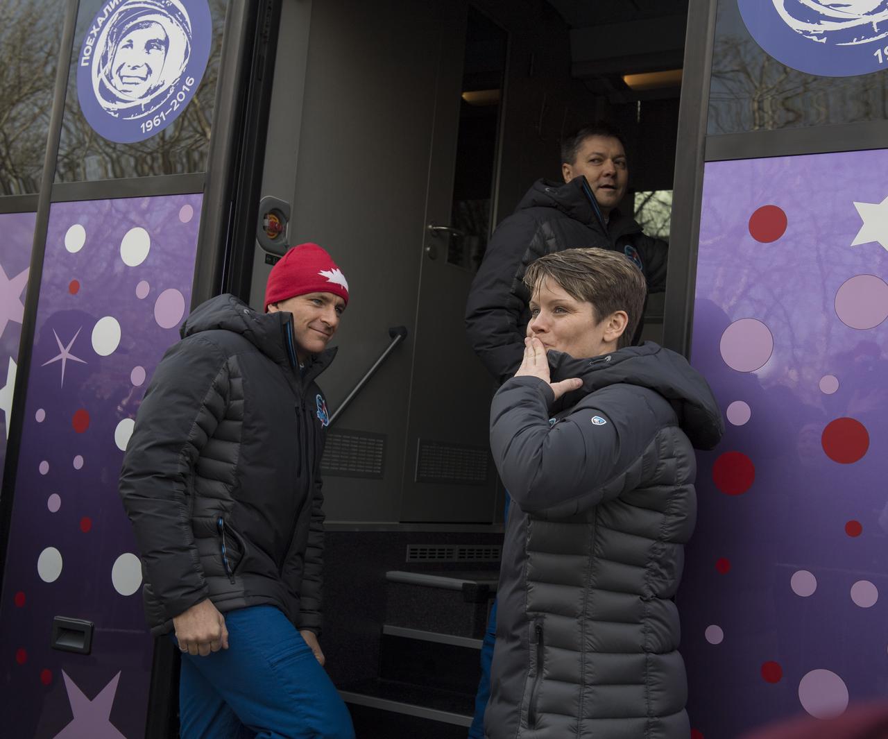 Expedition 58 Flight Engineer Anne McClain of NASA blows a kiss to friends and family before boarding a bus to suit-up for her Soyuz launch to the International Space Station on Monday, Dec. 3, 2018 in Baikonur, Kazakhstan. Launch of the Soyuz rocket is scheduled for Dec. 3 and will send McClain, Soyuz Commander Oleg Kononenko of Roscosmos, and Flight Engineer David Saint-Jacques of the Canadian Space Agency (CSA) on a six and a half month mission aboard the International Space Station. Photo Credit: (NASA/Aubrey Gemignani)