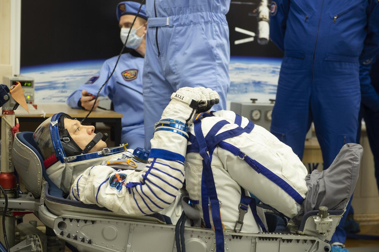 Expedition 58 Soyuz Commander Oleg Kononenko of Roscosmos has his Russian Sokol suit pressure checked in preparation for his launch aboard the Soyuz MS-11 spacecraft on Monday, Dec. 3, 2018, at the Baikonur Cosmodrome in Kazakhstan. Launch of the Soyuz rocket is scheduled for the same day and will carry Kononenko, Flight Engineer Anne McClain of NASA, and Flight Engineer David Saint-Jacques of the Canadian Space Agency (CSA) into orbit to begin their six and a half month mission on the International Space Station. Photo Credit: ((GCTC/NASA/Andrey Shelepin))