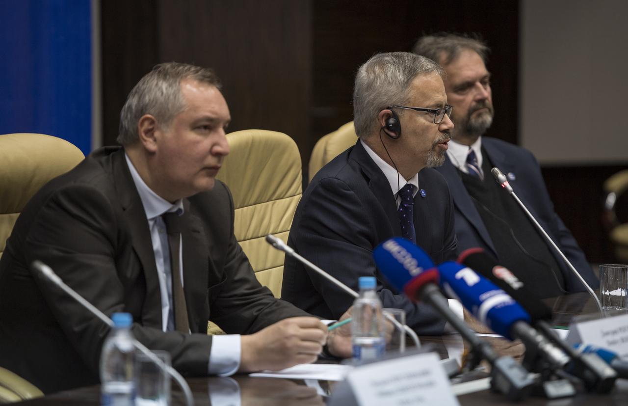 Sylvain Laporte, president, Canadian Space Agency (CSA), center, discusses the successful launch and docking of the Expedition 58 crew to the International Space Station during a post-docking news conference Dec. 4 in Baikonur, Kazakhstan. At the news conference, Dmitry Rogozin, the head of Roscosmos, announced that NASA astronaut Nick Hague and Roscosmos cosmonaut Alexey Ovchinin, who were involved in the abort of their first launch Oct. 11, would be reflown on Feb. 28, along with NASA astronaut Christina Koch as the Expedition 59-60 crew. Photo Credit: (NASA/Aubrey Gemignani)