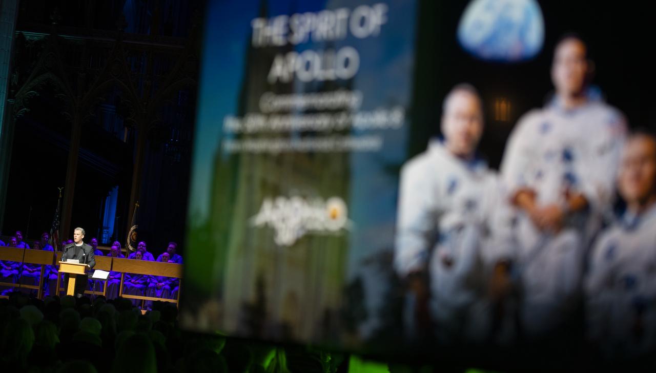 The Very Reverend Randy Hollerith, Dean of the Washington National Cathedral welcomes everyone to the Smithsonian National Air and Space Museum's Spirit of Apollo event commemorating the 50th anniversary of Apollo 8, Tuesday, Dec. 11, 2018 at the Washington National Cathedral in Washington, DC. Apollo 8 was humanity's first journey to another world, taking astronauts Frank Borman, Jim Lovell, and William Anders to the Moon and back in December of 1968. Photo Credit: (NASA/Joel Kowsky)