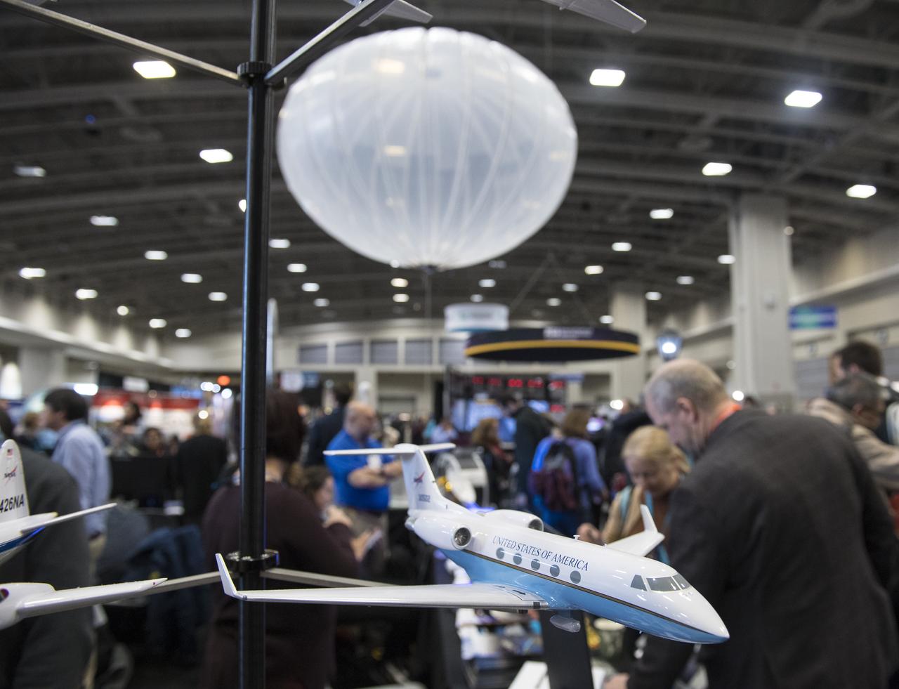 NASA booths are seen at the American Geophysical Union (AGU) annual meeting, Tuesday, Dec. 11, 2018 at the Washington Convention Center in Washington, DC. Photo Credit: (NASA/Aubrey Gemignani)