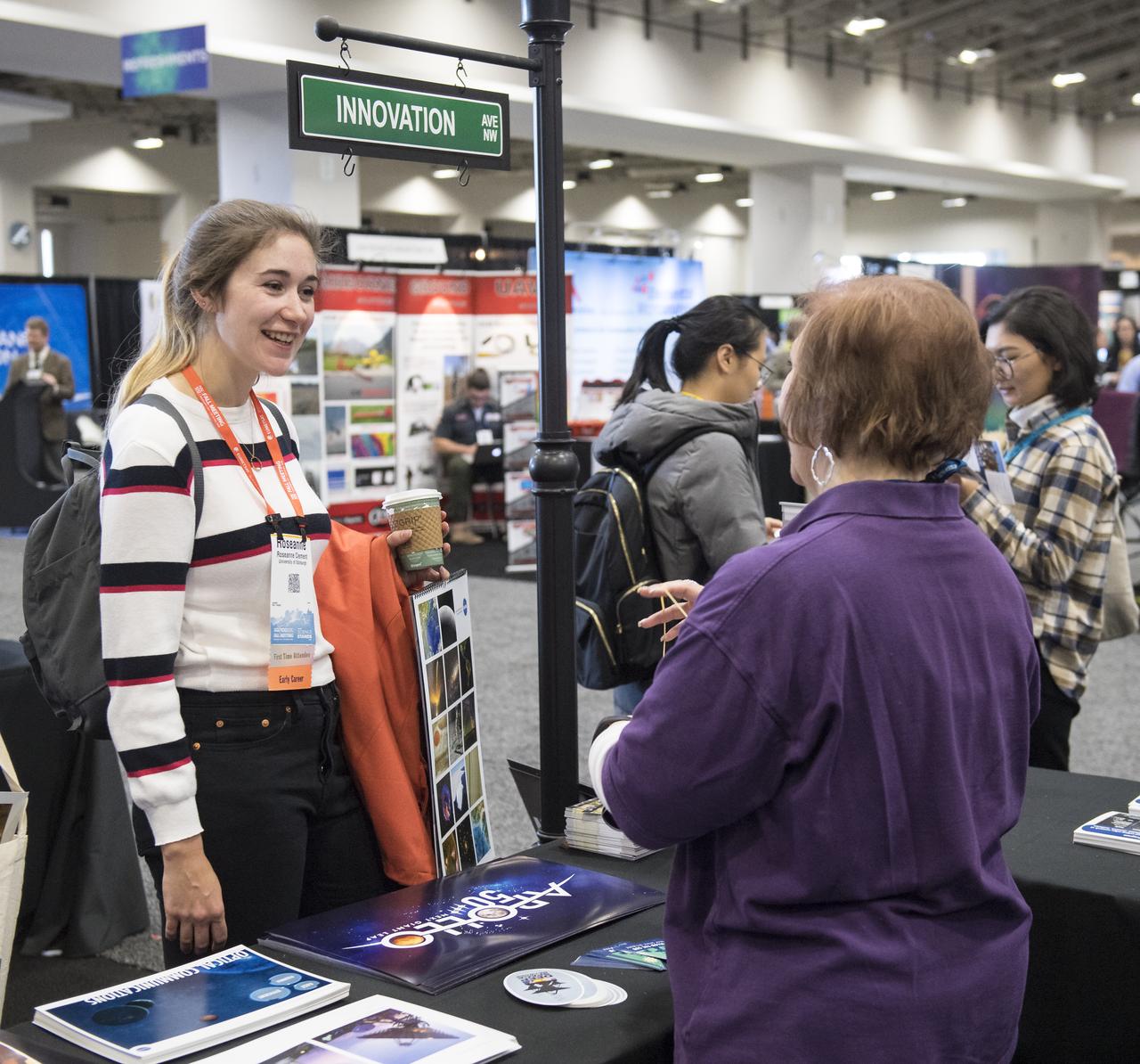 NASA booths are seen at the American Geophysical Union (AGU) annual meeting, Tuesday, Dec. 11, 2018 at the Washington Convention Center in Washington, DC. Photo Credit: (NASA/Aubrey Gemignani)