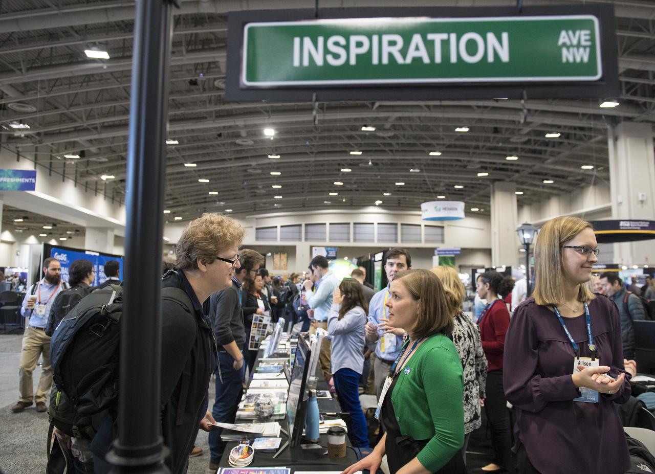 NASA booths are seen at the American Geophysical Union (AGU) annual meeting, Tuesday, Dec. 11, 2018 at the Washington Convention Center in Washington, DC. Photo Credit: (NASA/Aubrey Gemignani)