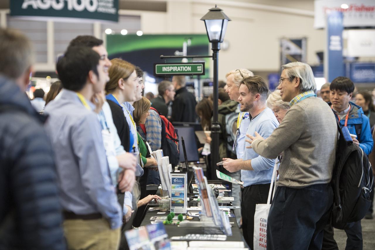 NASA booths are seen at the American Geophysical Union (AGU) annual meeting, Tuesday, Dec. 11, 2018 at the Washington Convention Center in Washington, DC. Photo Credit: (NASA/Aubrey Gemignani)