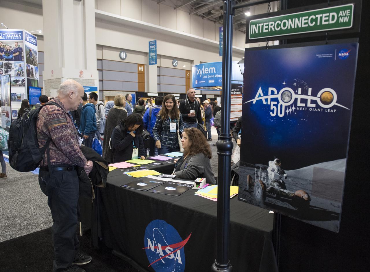 NASA booths are seen at the American Geophysical Union (AGU) annual meeting, Tuesday, Dec. 11, 2018 at the Washington Convention Center in Washington, DC. Photo Credit: (NASA/Aubrey Gemignani)
