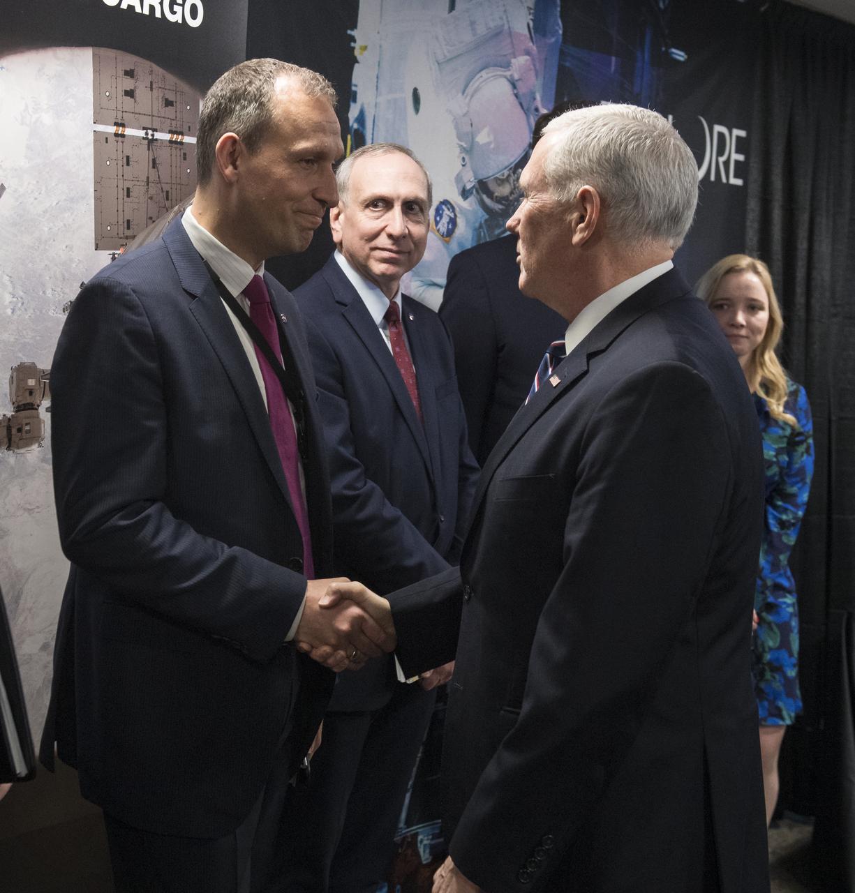 Vice President Mike Pence shakes hands with Thomas Zurbuchen, associate administrator, Science Mission Directorate, NASA, after a discussion about the progress on Space Policy Directive 1 (SPD-1), Wednesday, Dec. 12, 2018 at NASA Headquarters in Washington. Photo Credit: (NASA/Aubrey Gemignani)