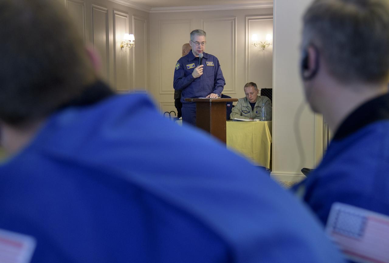 Deputy Head of the Search-and-Rescue Department of Rosaviatsiya (Russian Federal Air Transport Agency) Aleksey Lukiyanov delivers his report during a meeting to discuss the readiness for the landing of Expedition 57 crew members Serena Auñón-Chancellor of NASA, Alexander Gerst of ESA (European Space Agency), and Sergey Prokopyev of Roscosmos, Tuesday, Dec. 18, 2018. Auñón-Chancellor, Gerst, and Prokopyev are returning after 197 days in space where they served as members of the Expedition 56 and 57 crews onboard the International Space Station. Photo Credit: (NASA/Bill Ingalls)