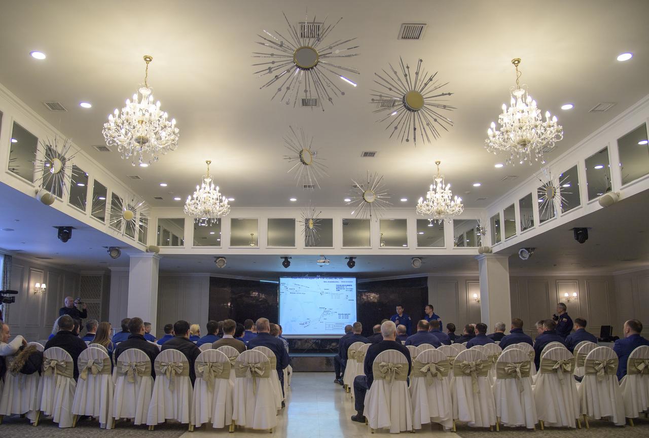 NASA, ESA, Roscosmos, and Russian Search and Recovery Forces meet at the Cosmonaut Hotel in Karaganda, Kazakhstan to discuss the readiness for the landing of Expedition 57 crew members Serena Auñón-Chancellor of NASA, Alexander Gerst of ESA (European Space Agency), and Sergey Prokopyev of Roscosmos, Tuesday, Dec. 18, 2018. Auñón-Chancellor, Gerst, and Prokopyev are returning after 197 days in space where they served as members of the Expedition 56 and 57 crews onboard the International Space Station. Photo Credit: (NASA/Bill Ingalls)