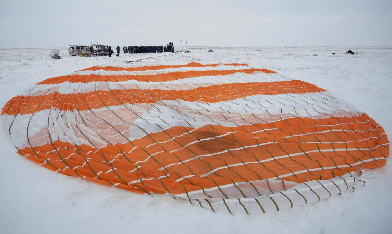 The parachute of the Soyuz MS-09 spacecraft is seen shortly the capsule landed with Expedition 57 crew members Serena Auñón-Chancellor of NASA, Alexander Gerst of ESA (European Space Agency), and Sergey Prokopyev of Roscosmos near the town of Zhezkazgan, Kazakhstan on Thursday, Dec. 20, 2018. Auñón-Chancellor, Gerst, and Prokopyev are returning after 197 days in space where they served as members of the Expedition 56 and 57 crews onboard the International Space Station. Photo Credit: (NASA/Bill Ingalls)