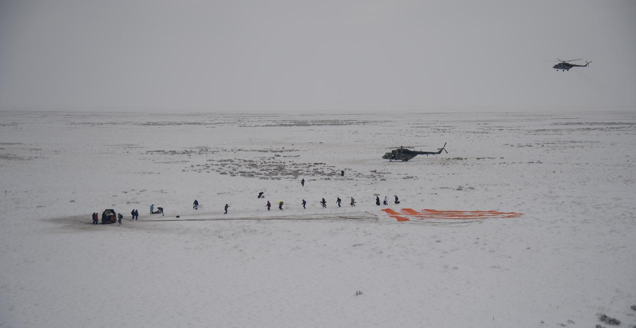 Russian Search and Rescue teams arrive at the Soyuz MS-09 spacecraft shortly after it landed with Expedition 57 crew members Serena Auñón-Chancellor of NASA, Alexander Gerst of ESA (European Space Agency), and Sergey Prokopyev of Roscosmos near the town of Zhezkazgan, Kazakhstan on Thursday, Dec. 20, 2018. Auñón-Chancellor, Gerst, and Prokopyev are returning after 197 days in space where they served as members of the Expedition 56 and 57 crews onboard the International Space Station. Photo Credit: (NASA/Bill Ingalls)