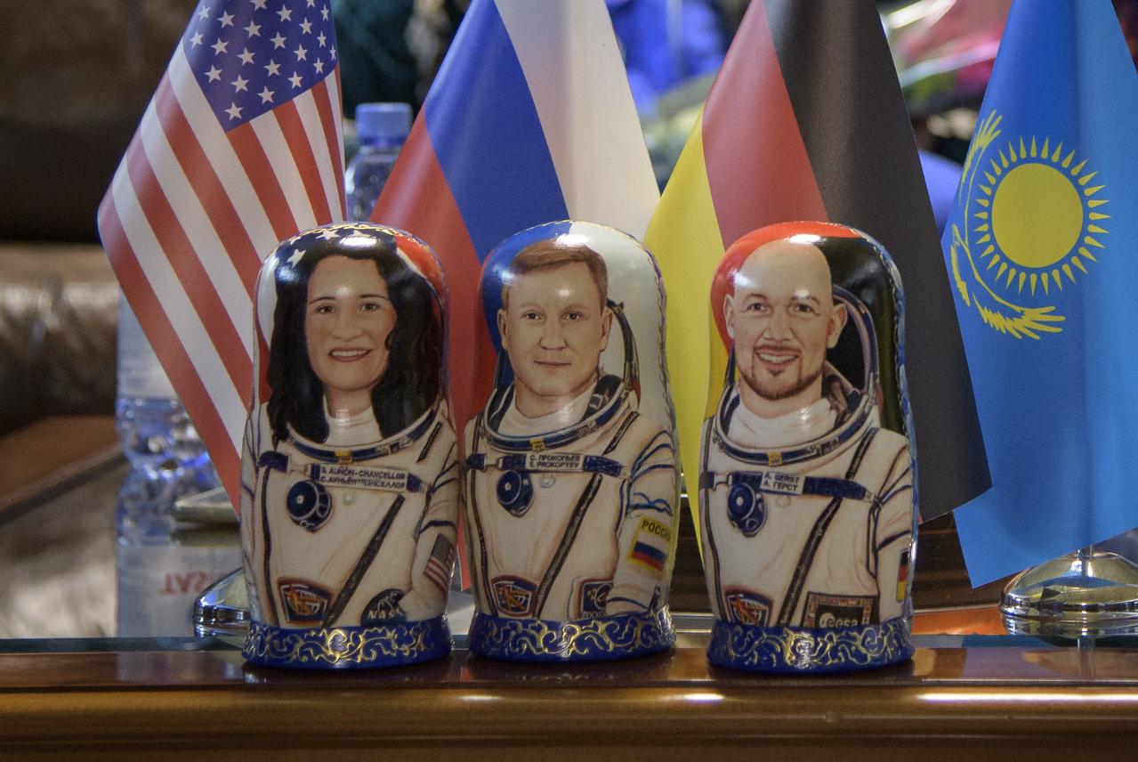Matryoshka Dolls depicting Expedition 57 crew members Serena Auñón-Chancellor of NASA, left, Sergey Prokopyev of Roscosmos, center, and Alexander Gerst of ESA (European Space Agency) are seen during a welcome ceremony at the Zhezkazgan, Kazakhstan airport on Thursday, Dec. 20, 2018. Auñón-Chancellor, Gerst, and Prokopyev are returning after 197 days in space where they served as members of the Expedition 56 and 57 crews onboard the International Space Station. Photo Credit: (NASA/Bill Ingalls)