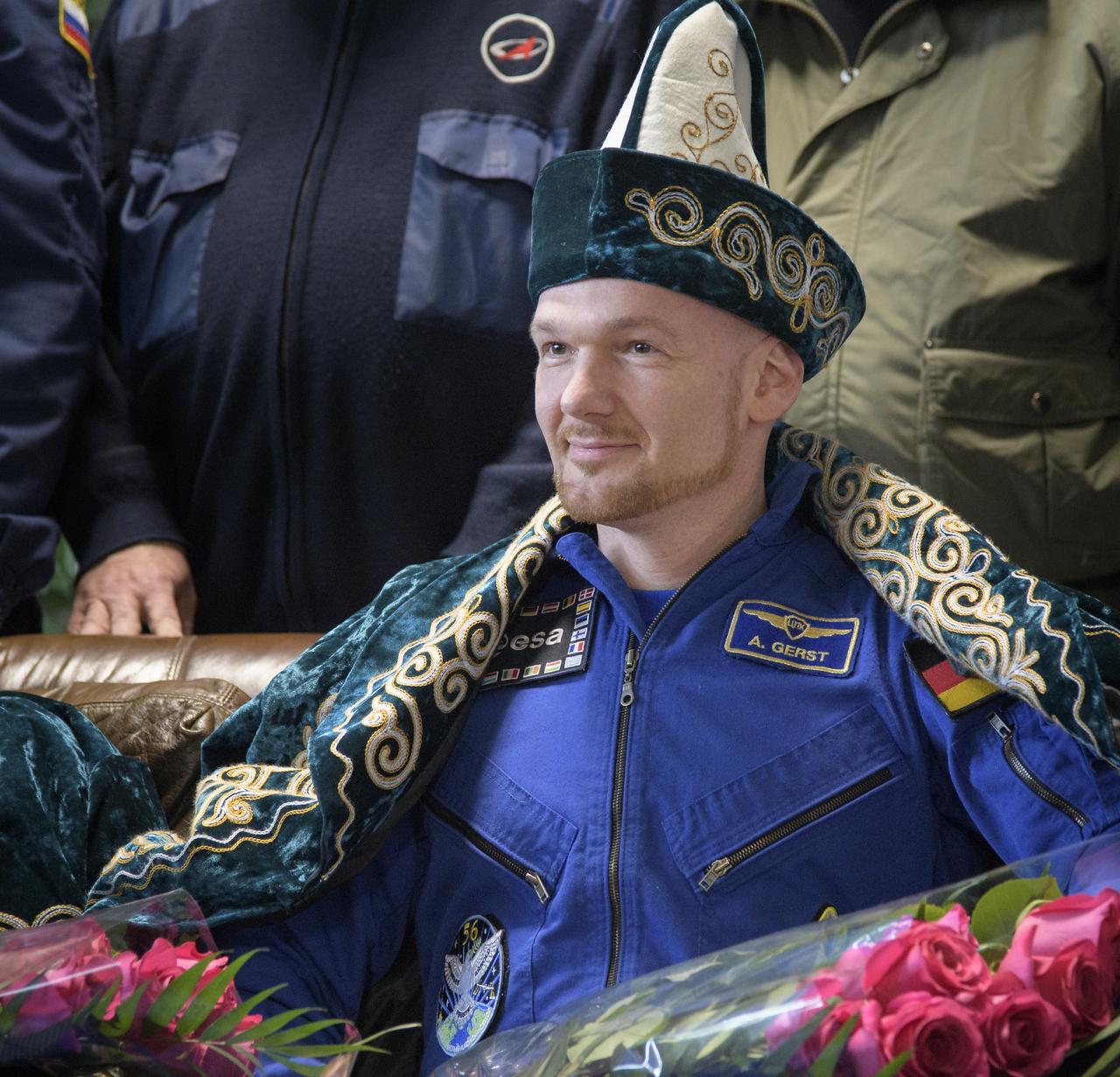Expedition 57 crew member Alexander Gerst of ESA (European Space Agency) is seen during a welcome ceremony at the Zhezkazgan, Kazakhstan airport shortly after he landed in a Soyuz MS-09 spacecraft with Sergey Prokopyev of Roscosmos, and Serena Auñón-Chancellor of NASA on Thursday, Dec. 20, 2018. Auñón-Chancellor, Gerst, and Prokopyev are returning after 197 days in space where they served as members of the Expedition 56 and 57 crews onboard the International Space Station. Photo Credit: (NASA/Bill Ingalls)
