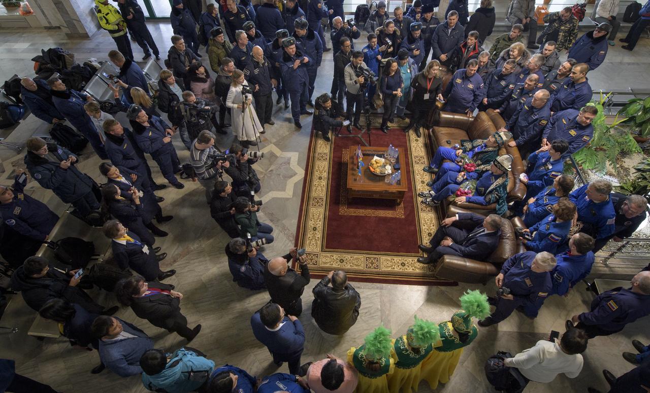 Expedition 57 crew members Sergey Prokopyev of Roscosmos and Alexander Gerst of ESA (European Space Agency) attend a welcome ceremony at the Zhezkazgan, Kazakhstan airport after they landed in their Soyuz MS-09 spacecraft with  Serena Auñón-Chancellor of NASA on Thursday, Dec. 20, 2018. Auñón-Chancellor, Gerst, and Prokopyev are returning after 197 days in space where they served as members of the Expedition 56 and 57 crews onboard the International Space Station. Photo Credit: (NASA/Bill Ingalls)