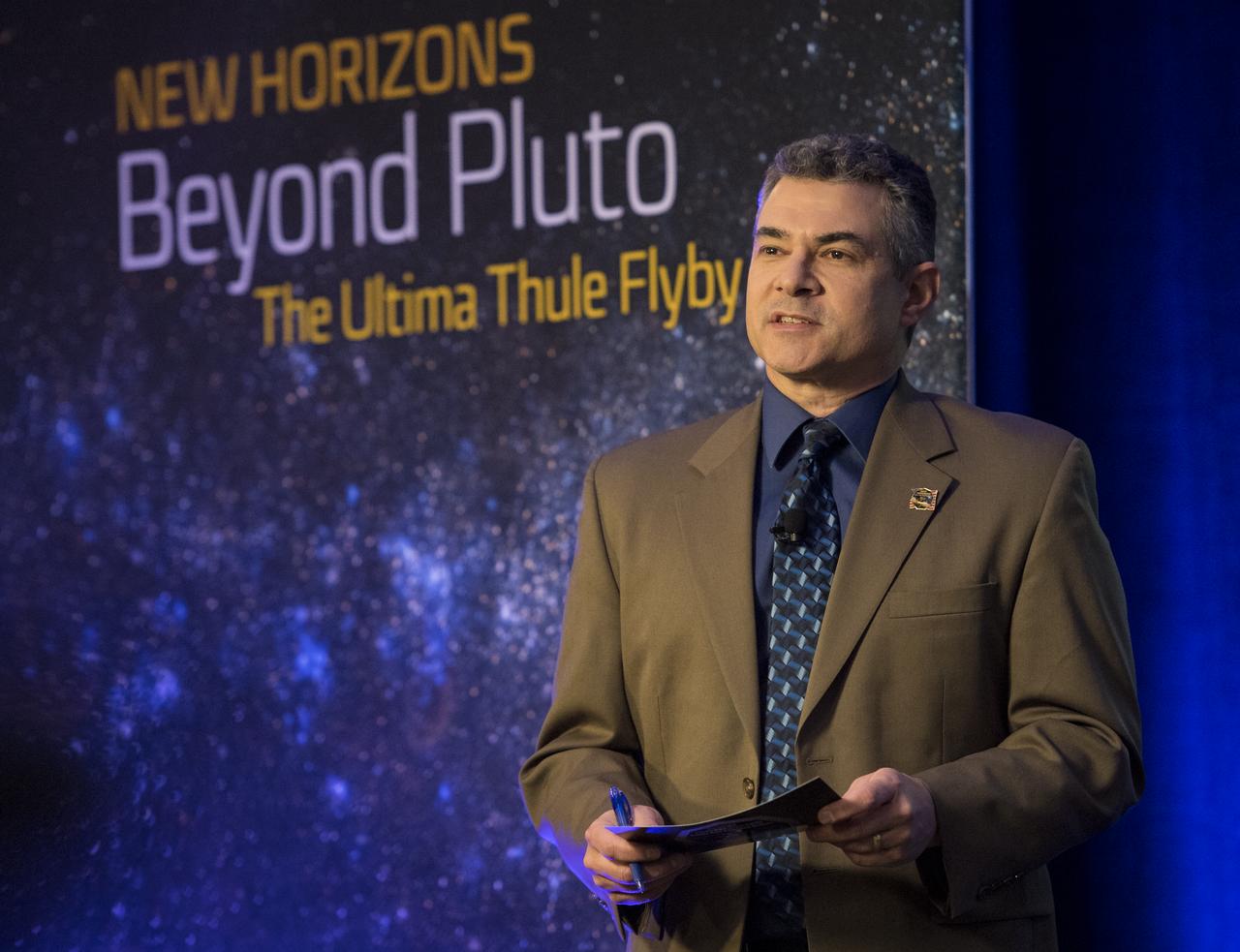 Mike Buckley, senior public information office at the Johns Hopkins University Applied Physics Laboratory speaks at the beginning of a press conference prior to the flyby of Ultima Thule by the New Horizons spacecraft, Monday, Dec. 31, 2018 at Johns Hopkins University Applied Physics Laboratory (APL) in Laurel, Maryland. Photo Credit: (NASA/Joel Kowsky)