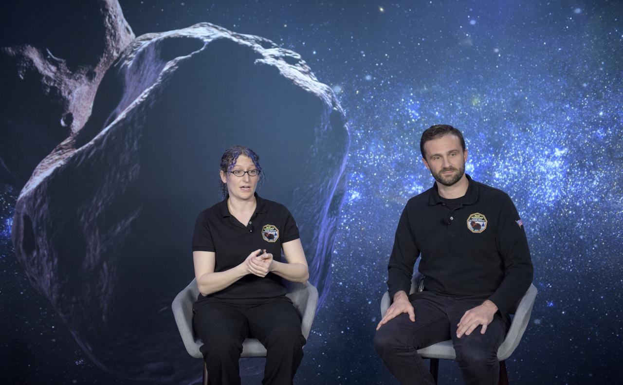 New Horizons co-investigator Kelsi Singer of the Southwest Research Institute (SwRI), Boulder, CO, and New Horizons science team affiliate Kirby Runyon of John Hopkins discuss the various instruments on the New Horizons spacecraft, Monday, Dec. 31, 2018 at Johns Hopkins University Applied Physics Laboratory (APL) in Laurel, Maryland. Photo Credit: (NASA/Bill Ingalls)