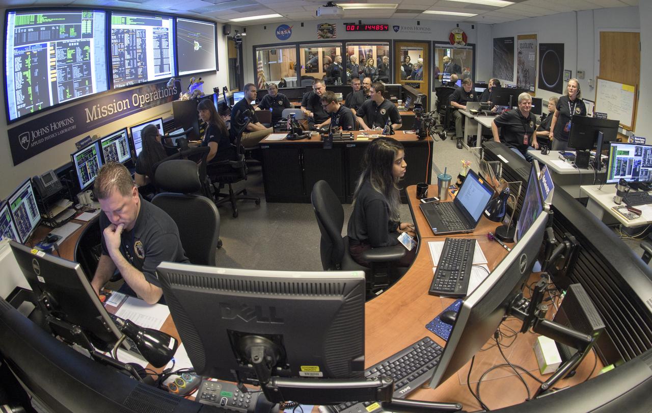 New Horizons team members wait for a signal from the spacecraft that it is healthy and collected data during the flyby of Ultima Thule, Tuesday, Jan. 1, 2019 at the Mission Operations Center of the Johns Hopkins University Applied Physics Laboratory (APL) in Laurel, Maryland. Photo Credit: (NASA/Bill Ingalls)