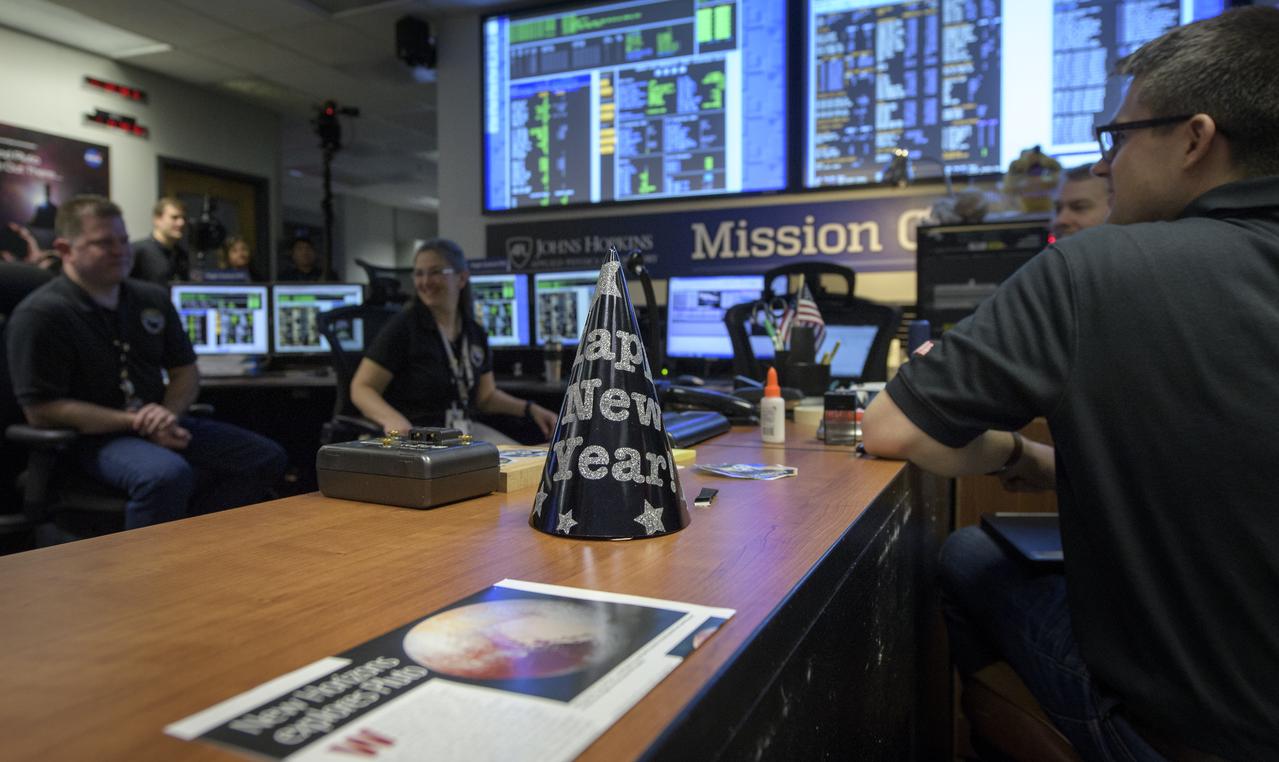New Horizons team members wait for a signal from the spacecraft that it is healthy and collected data during the flyby of Ultima Thule, Tuesday, Jan. 1, 2019 at the Mission Operations Center of the Johns Hopkins University Applied Physics Laboratory (APL) in Laurel, Maryland. Photo Credit: (NASA/Bill Ingalls)
