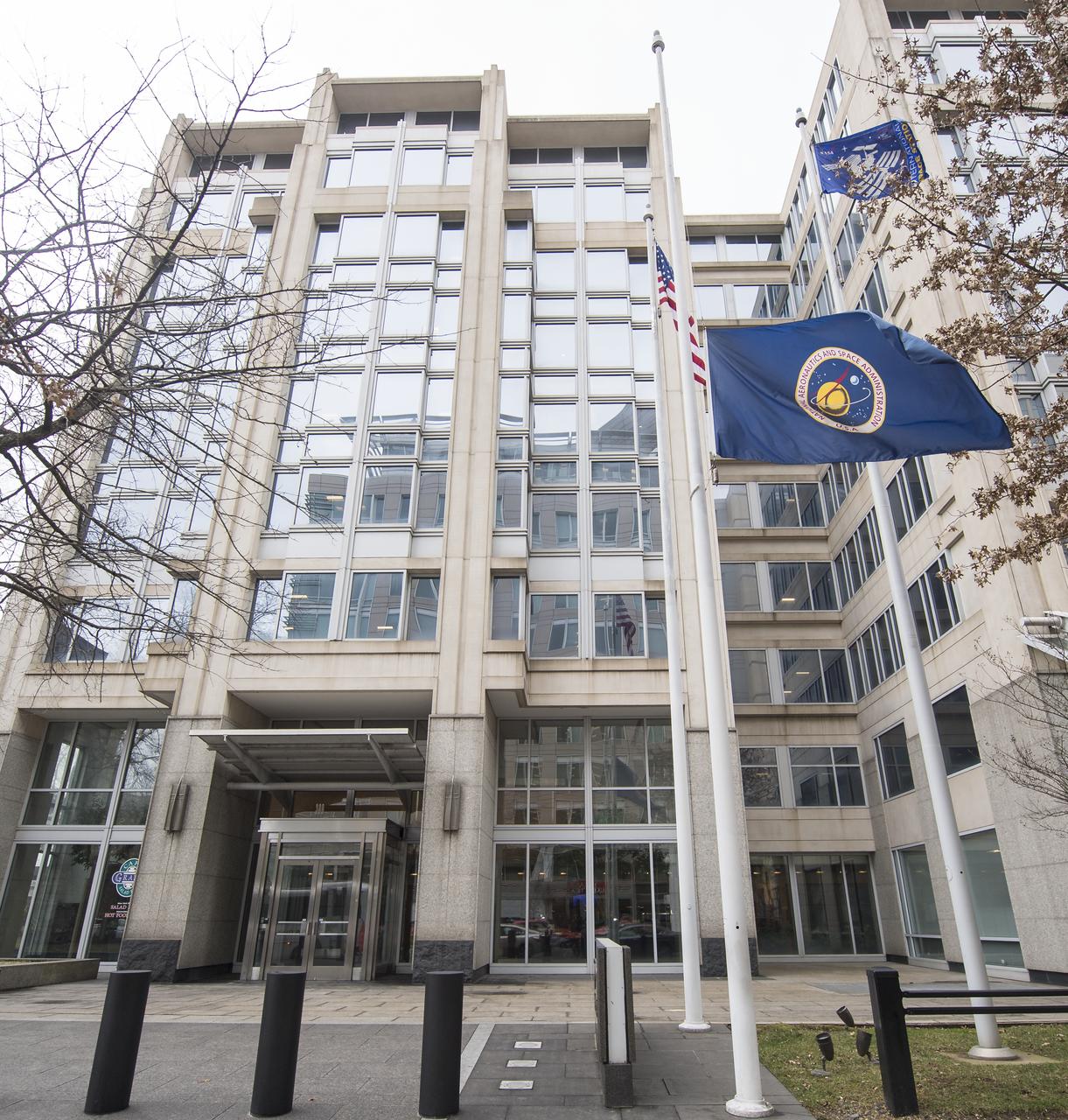 The NASA flag is seen flying at half-staff on NASA's Day of Remembrance, Thursday, Feb. 7, 2019, at NASA Headquarters in Washington. Wreaths will be laid at memorial sites in Arlington National Cemetery later today in memory of those men and women who lost their lives in the quest for space exploration. Photo Credit: (NASA/Aubrey Gemignani)