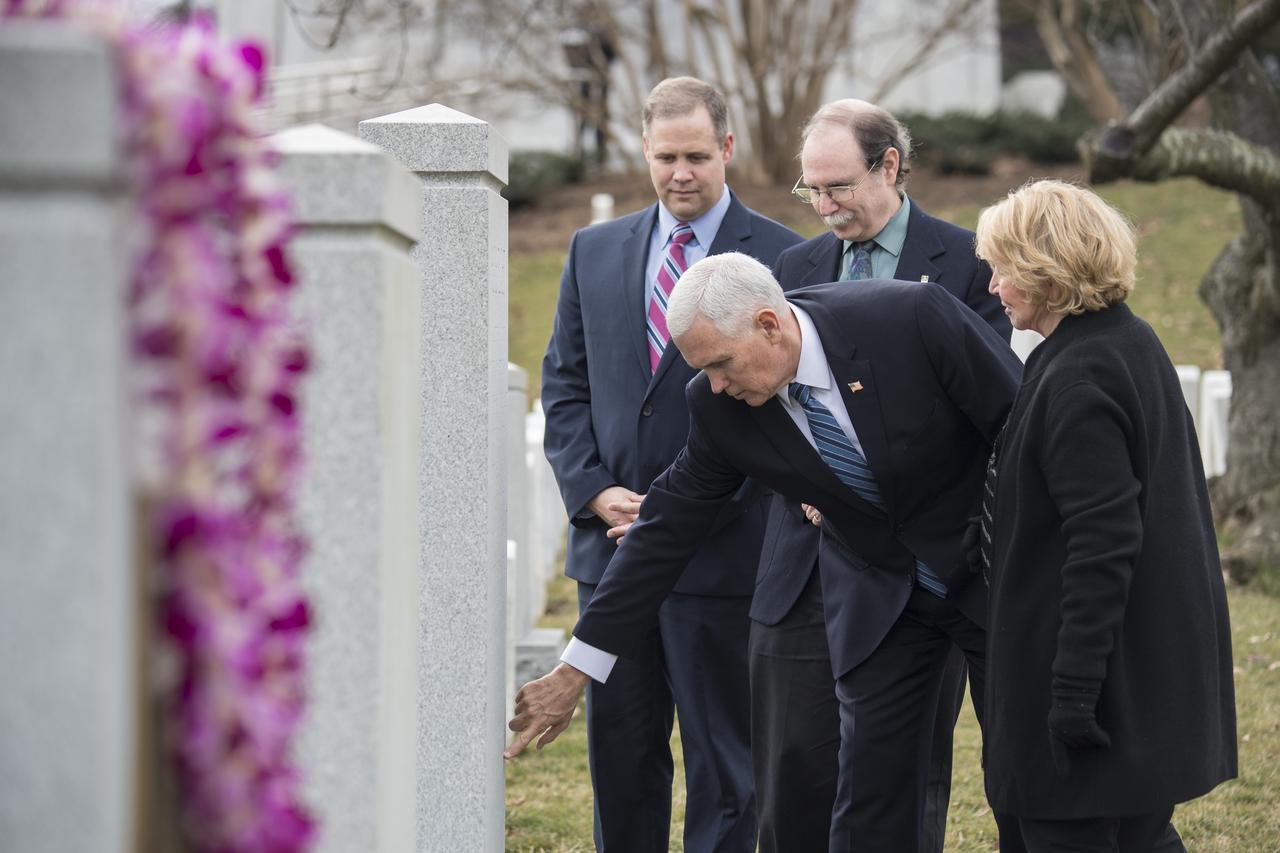 Vice President Mike Pence visits the Space Shuttle Challenger Memorial with June Scobee-Rodgers, widow of Challenger Commander Dick Scobee, right, NASA Administrator Jim Bridenstine, left, and Chuck Resnik, brother of Challenger Mission Specialist Judith Resnik, second left, after a wreath laying ceremony that was part of NASA's Day of Remembrance, Thursday, Feb. 7, 2019, at Arlington National Cemetery in Arlington, Va. Wreaths were laid in memory of those men and women who lost their lives in the quest for space exploration.  Photo Credit: (NASA/Aubrey Gemignani)