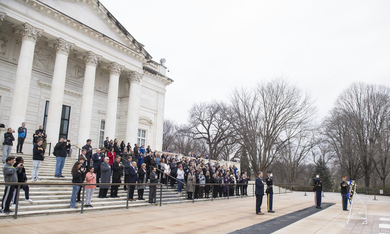 Taps is played by a member of The Old Guard after NASA Administrator Jim Bridenstine laid a wreath at the Tomb of the Unknowns as part of NASA's Day of Remembrance, Thursday, Feb. 7, 2019, at Arlington National Cemetery in Arlington, Va.  The wreaths were laid in memory of those men and women who lost their lives in the quest for space exploration.  Photo Credit: (NASA/Aubrey Gemignani)