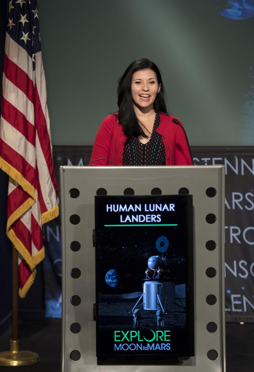 NASA Associate Administrator for the Office of Communications Bettina Inclán speaks at the opening an industry forum on the agency's lunar exploration plans, Thursday, Feb. 14, 2019 at NASA Headquarters in Washington. The agency will work with industry to study and refine the approach to landing on the Moon, which includes a system of three separate elements that will provide astronauts transportation, landing, and safe return. Photo Credit: (NASA/Joel Kowsky)