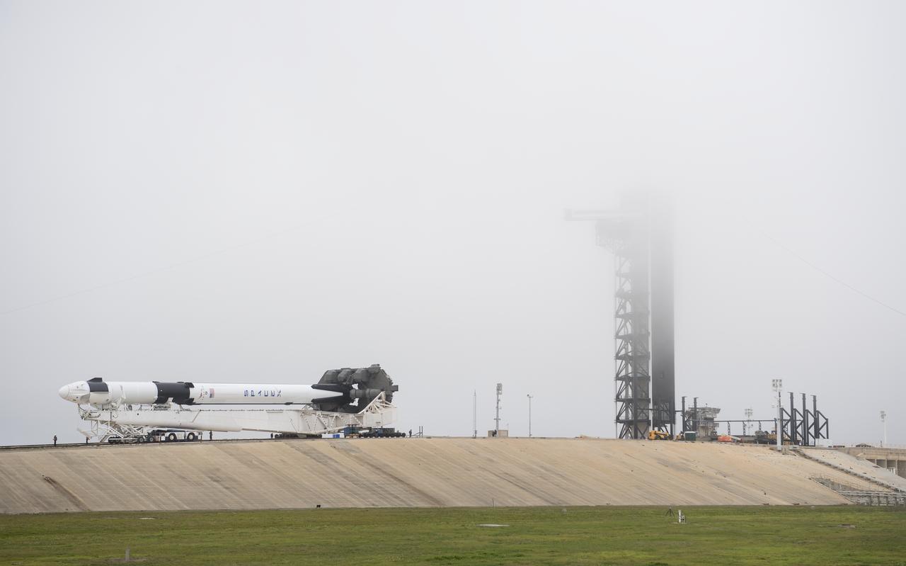 A SpaceX Falcon 9 rocket with the company's Crew Dragon spacecraft onboard is seen as it is rolled to the launch pad at Launch Complex 39A as preparations continue for the Demo-1 mission, Feb. 28, 2019 at the Kennedy Space Center in Florida. The Demo-1 mission will be the first launch of a commercially built and operated American spacecraft and space system designed for humans as part of NASA's Commercial Crew Program. The mission, currently targeted for a 2:49am launch on March 2, will serve as an end-to-end test of the system's capabilities. Photo Credit: (NASA/Joel Kowsky)