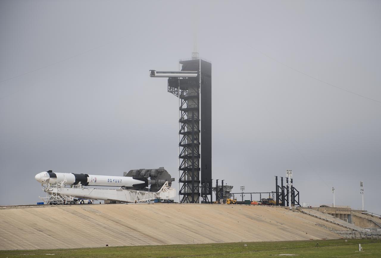 A SpaceX Falcon 9 rocket with the company's Crew Dragon spacecraft onboard is seen as it is rolled to the launch pad at Launch Complex 39A as preparations continue for the Demo-1 mission, Feb. 28, 2019 at the Kennedy Space Center in Florida. The Demo-1 mission will be the first launch of a commercially built and operated American spacecraft and space system designed for humans as part of NASA's Commercial Crew Program. The mission, currently targeted for a 2:49am launch on March 2, will serve as an end-to-end test of the system's capabilities. Photo Credit: (NASA/Joel Kowsky)