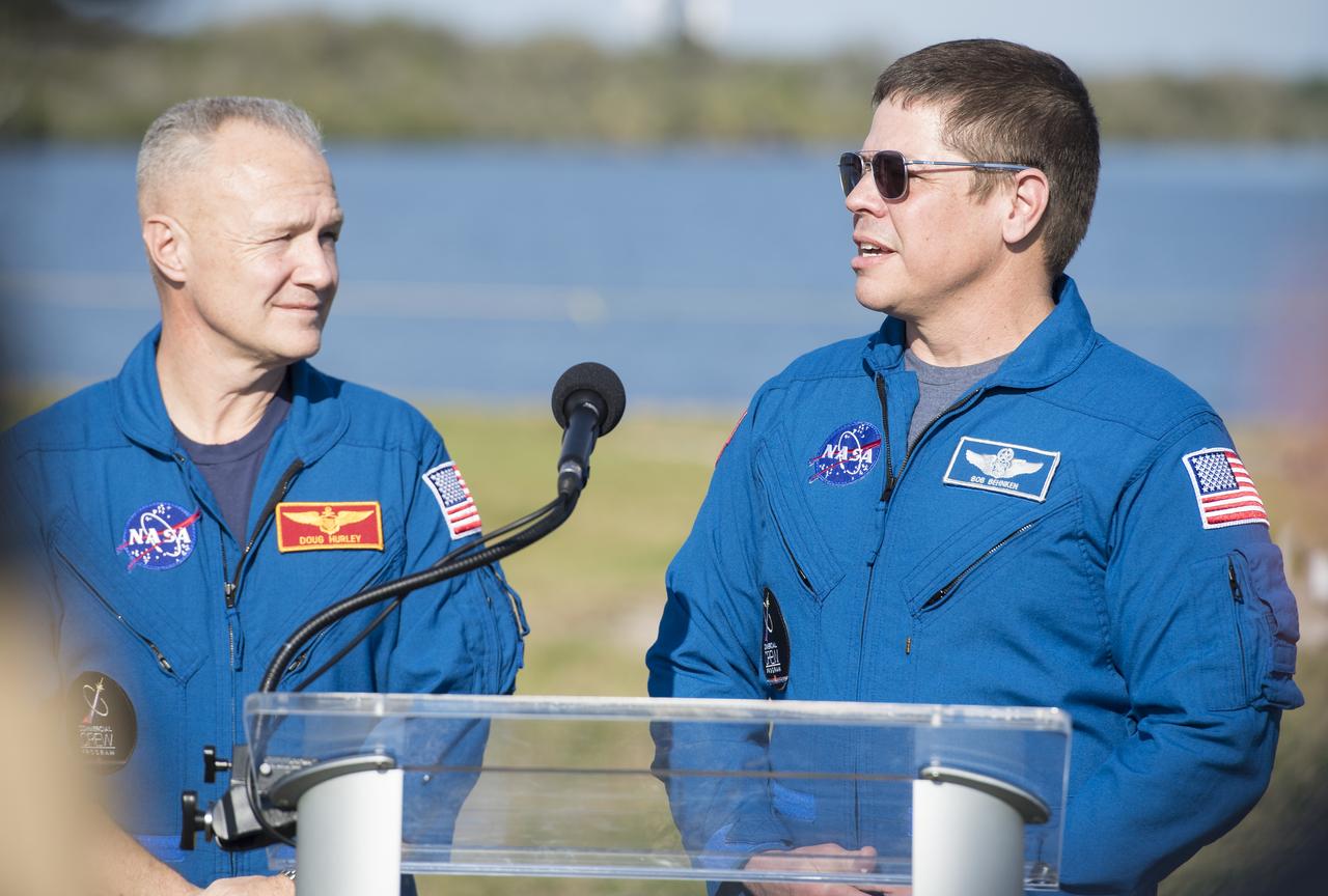 NASA astronauts Bob Behnken, right, and Doug Hurley, who are assigned to the first crewed test flight of SpaceX's Crew Dragon answer questions during a press conference ahead of the SpaceX Demo-1 mission, Friday, March 1, 2019 at the Kennedy Space Center in Florida. The Demo-1 mission will be the first launch of a commercially built and operated American spacecraft and space system designed for humans as part of NASA's Commercial Crew Program. The mission, currently targeted for a 2:49am launch on March 2, will serve as an end-to-end test of the system's capabilities. Photo Credit: (NASA/Joel Kowsky)
