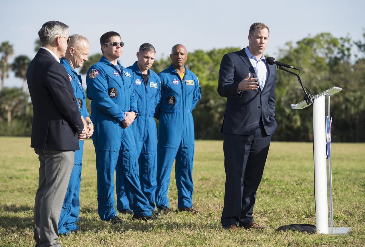 NASA Administrator Jim Bridenstine, Kennedy Space Center Director Bob Cabana, and NASA astronauts Bob Behnken and Doug Hurley who are assigned to the company’s first test flight, and Mike Hopkins and Victor Glover who are assigned to the first operational mission for SpaceX’s Crew Dragon speak during a press conference ahead of the SpaceX Demo-1 mission, Friday, March 1, 2019 at the Kennedy Space Center in Florida. The Demo-1 mission will be the first launch of a commercially built and operated American spacecraft and space system designed for humans as part of NASA's Commercial Crew Program. The mission, currently targeted for a 2:49am launch on March 2, will serve as an end-to-end test of the system's capabilities. Photo Credit: (NASA/Joel Kowsky)