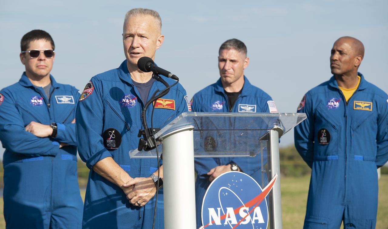 NASA astronaut Doug Hurley, second from left, answers questions during a press conference ahead of the SpaceX Demo-1 mission, Friday, March 1, 2019 at the Kennedy Space Center in Florida. Hurley and Bob Behnken, left, are assigned to the company’s first crewed test flight, and Mike Hopkins, second from right, and Victor Glover, right, are assigned to the first operational mission for Crew Dragon. The Demo-1 mission will be the first launch of a commercially built and operated American spacecraft and space system designed for humans as part of NASA's Commercial Crew Program. The mission, currently targeted for a 2:49am launch on March 2, will serve as an end-to-end test of the system's capabilities. Photo Credit: (NASA/Joel Kowsky)