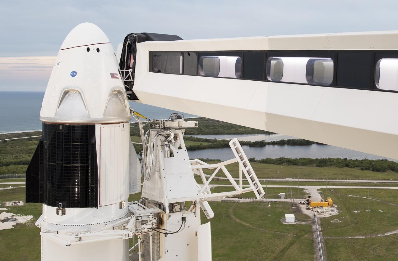 The SpaceX Crew Dragon spacecraft is seen atop the company's Falcon 9 rocket on the launch pad of Launch Complex 39A before the early Saturday morning launch of the Demo-1 mission, Friday, March 1, 2019 at the Kennedy Space Center in Florida. The Demo-1 mission launched at 2:49am ET on Saturday, March 2 and was the first launch of a commercially built and operated American spacecraft and space system designed for humans as part of NASA's Commercial Crew Program. The mission will serve as an end-to-end test of the system's capabilities. Photo Credit: (NASA/Joel Kowsky)