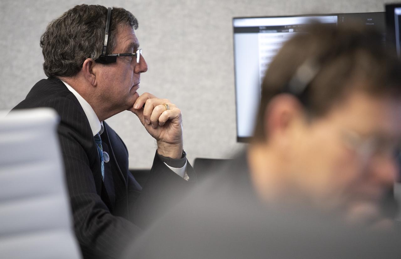 NASA International Space Station Program Manager Kirk Shireman monitors the countdown of the launch of a SpaceX Falcon 9 rocket carrying the company's Crew Dragon spacecraft on the Demo-1 mission from firing room four of the Launch Control Center, Saturday, March 2, 2019 at the Kennedy Space Center in Florida. The Demo-1 mission will be the first launch of a commercially built and operated American spacecraft and space system designed for humans as part of NASA's Commercial Crew Program. The mission will serve as an end-to-end test of the system's capabilities. Photo Credit: (NASA/Joel Kowsky)