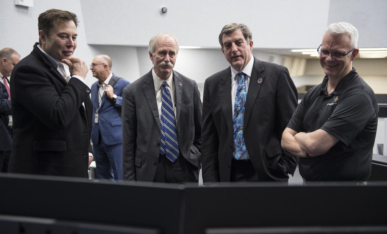 SpaceX CEO and Chief Designer Elon Musk, left, NASA Associate Administrator for the Human Exploration and Operations Mission Directorate William Gerstenmaier, second from left, NASA International Space Station Program Manager Kirk Shireman, second from right, and SpaceX Director of Crew Mission Management Benji Reed, right, watch the progress of the Crew Dragon spacecraft after launch from firing room four of the Launch Control Center, Saturday, March 2, 2019 at the Kennedy Space Center in Florida. The Demo-1 mission is the first launch of a commercially built and operated American spacecraft and space system designed for humans as part of NASA's Commercial Crew Program. The mission will serve as an end-to-end test of the system's capabilities. Photo Credit: (NASA/Joel Kowsky)