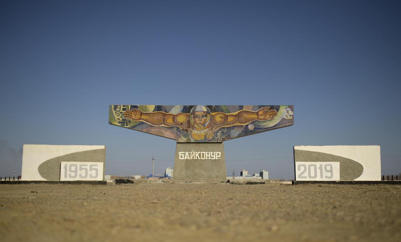 A mosaic sign welcoming visitors is seen outside the town of Baikonur, Kazakhstan, Monday, March 11, 2019 in Baikonur, Kazakhstan. Expedition 59 crewmembers Nick Hague and Christina Koch of NASA, along with Alexey Ovchinin of Roscosmos, will launch March 14, U.S. time, on the Soyuz MS-12 spacecraft from the Baikonur Cosmodrome for a six-and-a-half month mission on the International Space Station. Photo Credit: (NASA/Bill Ingalls)