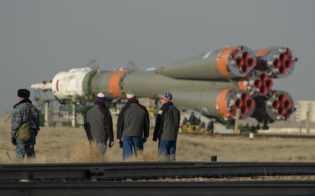 Expedition 59 backup crewmembers Alexander Skvortsov of Roscosmos, Luca Parmitano of the European Space Agency, and Drew Morgan of NASA, right, watch as the Soyuz rocket is transported by train to the launch pad, Tuesday, March 12, 2019 at the Baikonur Cosmodrome in Kazakhstan. Expedition 59 crewmembers Nick Hague and Christina Koch of NASA, along with Alexey Ovchinin of Roscosmos, will launch March 14, U.S. time, on the Soyuz MS-12 spacecraft from the Baikonur Cosmodrome for a six-and-a-half month mission on the International Space Station. Photo Credit: (NASA/Bill Ingalls)