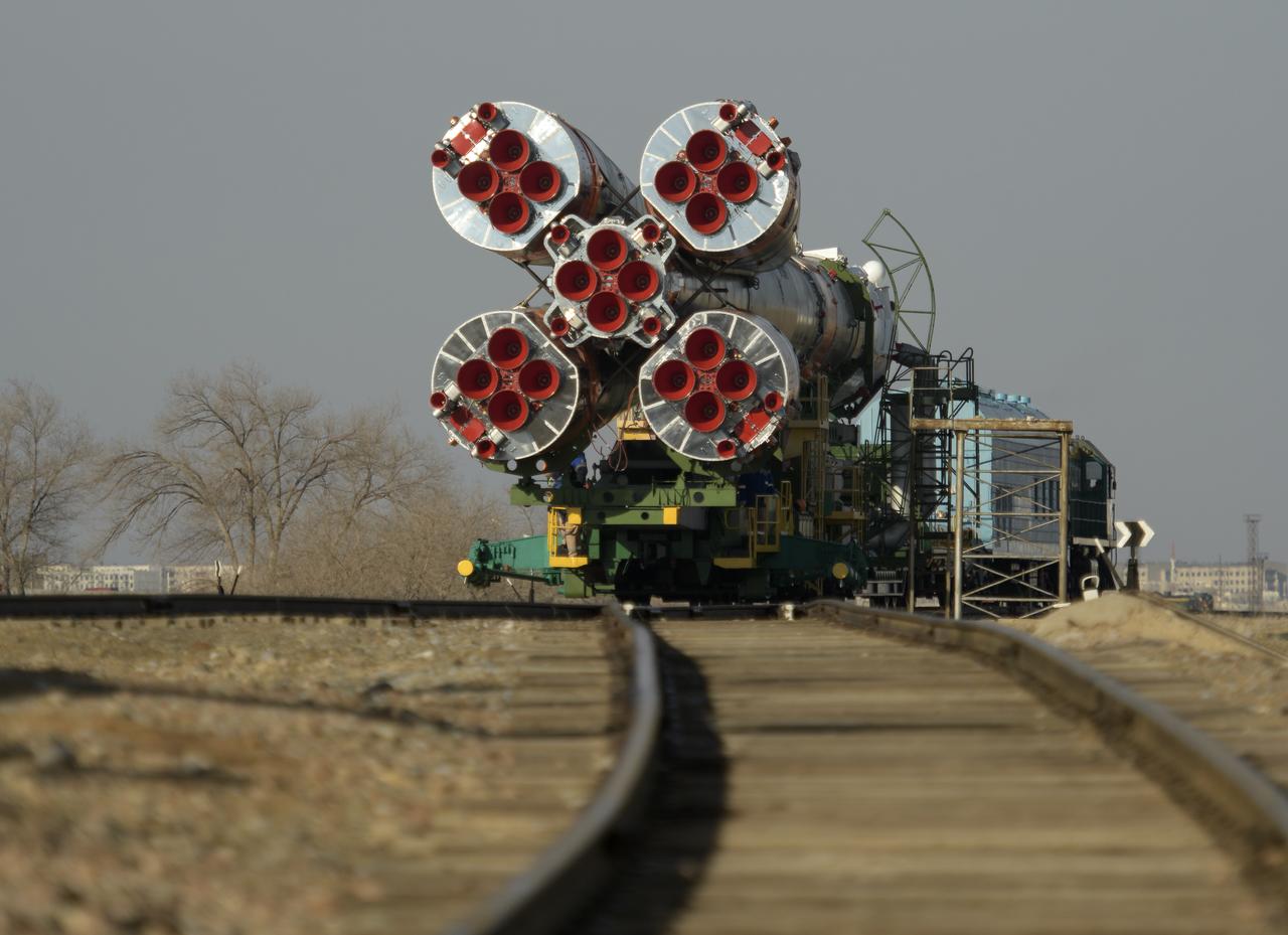 The Soyuz rocket is transported by train to the launch pad, Tuesday, March 12, 2019 at the Baikonur Cosmodrome in Kazakhstan. Expedition 59 crewmembers Nick Hague and Christina Koch of NASA, along with Alexey Ovchinin of Roscosmos, will launch March 14, U.S. time, on the Soyuz MS-12 spacecraft from the Baikonur Cosmodrome for a six-and-a-half month mission on the International Space Station. Photo Credit: (NASA/Bill Ingalls)