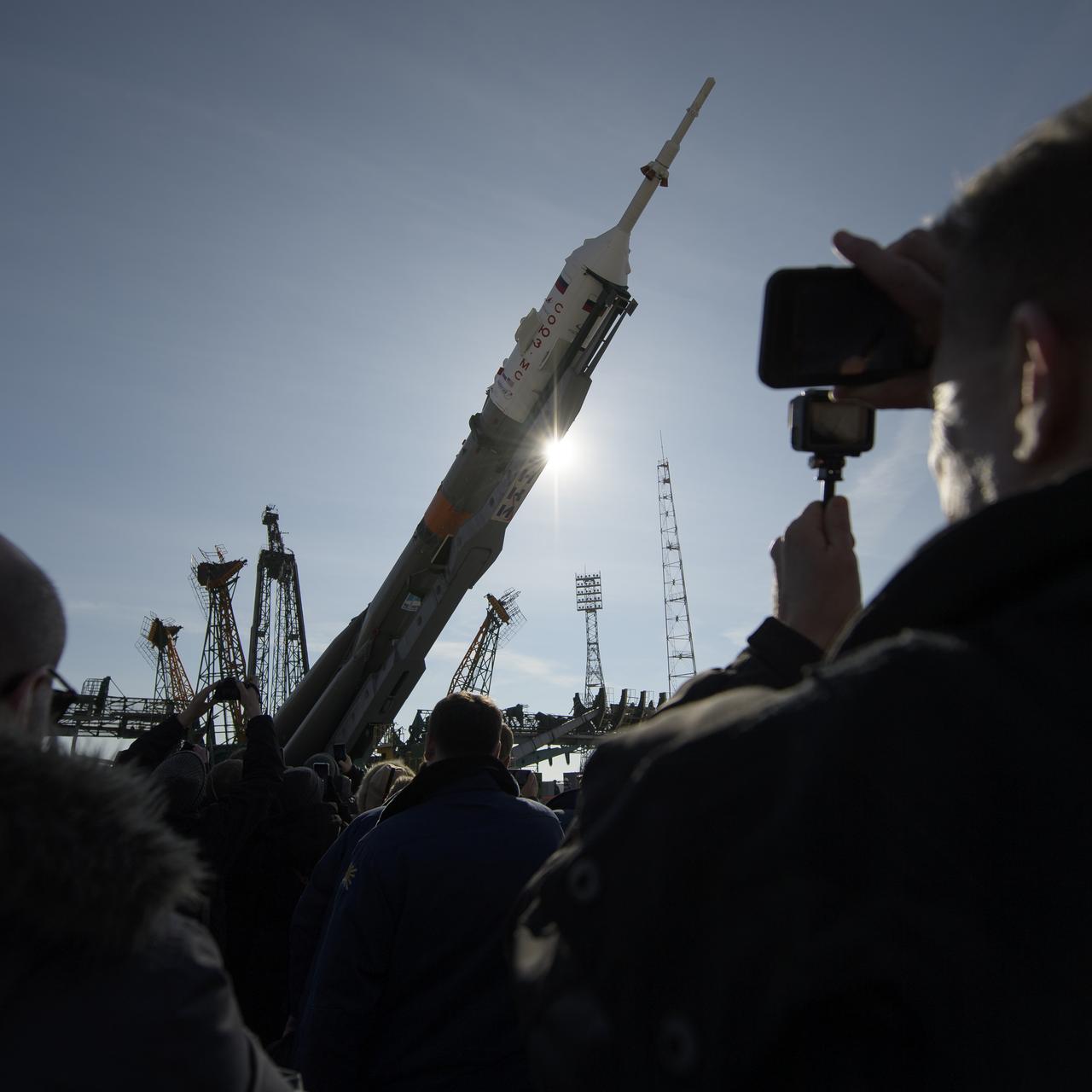 The Soyuz rocket is raised into vertical position on the launch pad, Tuesday, March 12, 2019 at the Baikonur Cosmodrome in Kazakhstan. Expedition 59 crewmembers Nick Hague and Christina Koch of NASA, along with Alexey Ovchinin of Roscosmos, will launch March 14, U.S. time, on the Soyuz MS-12 spacecraft from the Baikonur Cosmodrome for a six-and-a-half month mission on the International Space Station. Photo Credit: (NASA/Bill Ingalls)