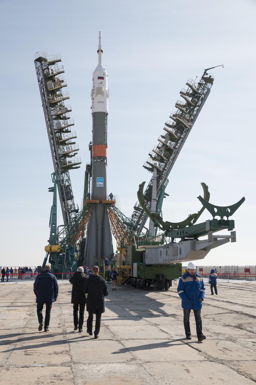 The Soyuz rocket is raised into vertical position on the launch pad, Tuesday, March 12, 2019 at the Baikonur Cosmodrome in Kazakhstan. Expedition 59 crewmembers Nick Hague and Christina Koch of NASA, along with Alexey Ovchinin of Roscosmos, will launch March 14, U.S. time, on the Soyuz MS-12 spacecraft from the Baikonur Cosmodrome for a six-and-a-half month mission on the International Space Station. Photo Credit: (NASA/Victor Zelentsov)