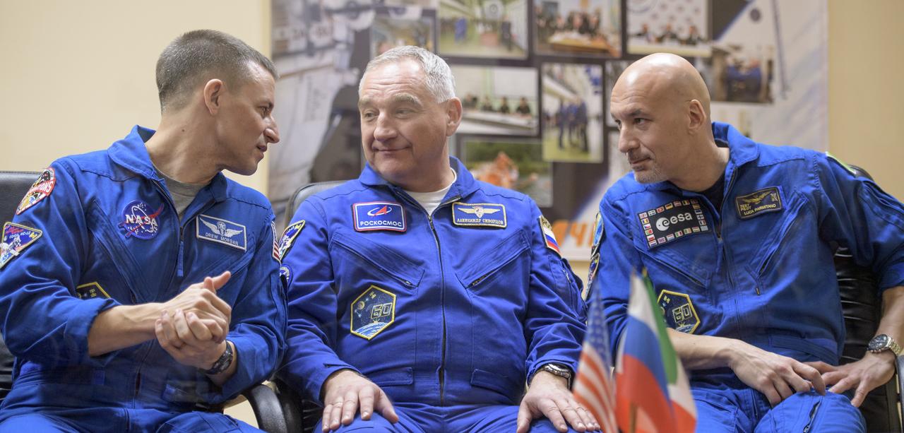 Expedition 59 backup crewmembers Drew Morgan of NASA, left, Alexander Skvortsov of Roscosmos, and Luca Parmitano of the European Space Agency, right, are seen during a press conference, Wednesday, March 13, 2019 at the Cosmonaut Hotel in Baikonur, Kazakhstan. Expedition 59 crewmembers Nick Hague and Christina Koch of NASA, along with Alexey Ovchinin of Roscosmos will launch March 14, U.S. time, on the Soyuz MS-12 spacecraft from the Baikonur Cosmodrome for a six-and-a-half month mission on the International Space Station. Photo Credit: (NASA/Bill Ingalls)