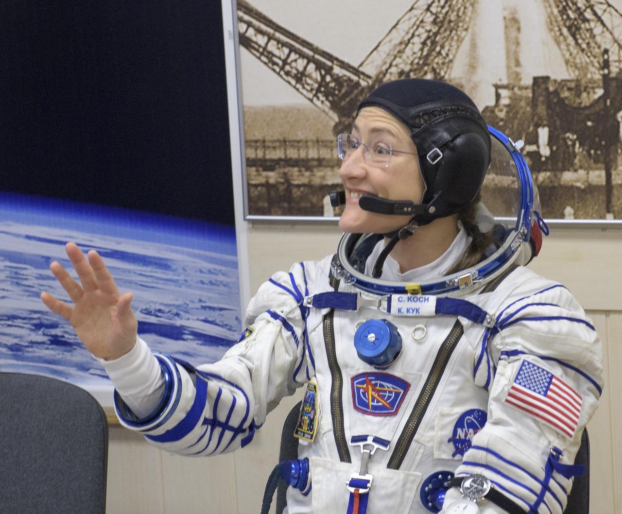 Expedition 59 astronaut Christina Koch of NASA prepares to have her Sokol suit pressure checked a few hours ahead of her launch on a Soyuz rocket with Nick Hague of NASA and Alexey Ovchinin of Roscosmos, Thursday, March 14, 2019 at the Baikonur Cosmodrome in Kazakhstan. Hague, Koch, and Ovchinin launched March 14, U.S. time, on the Soyuz MS-12 spacecraft from the Baikonur Cosmodrome for a six-and-a-half month mission on the International Space Station. Photo Credit: (NASA/Bill Ingalls)